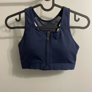 Nike Dri-FIT Swoosh zip-front sports bra in a dark blue